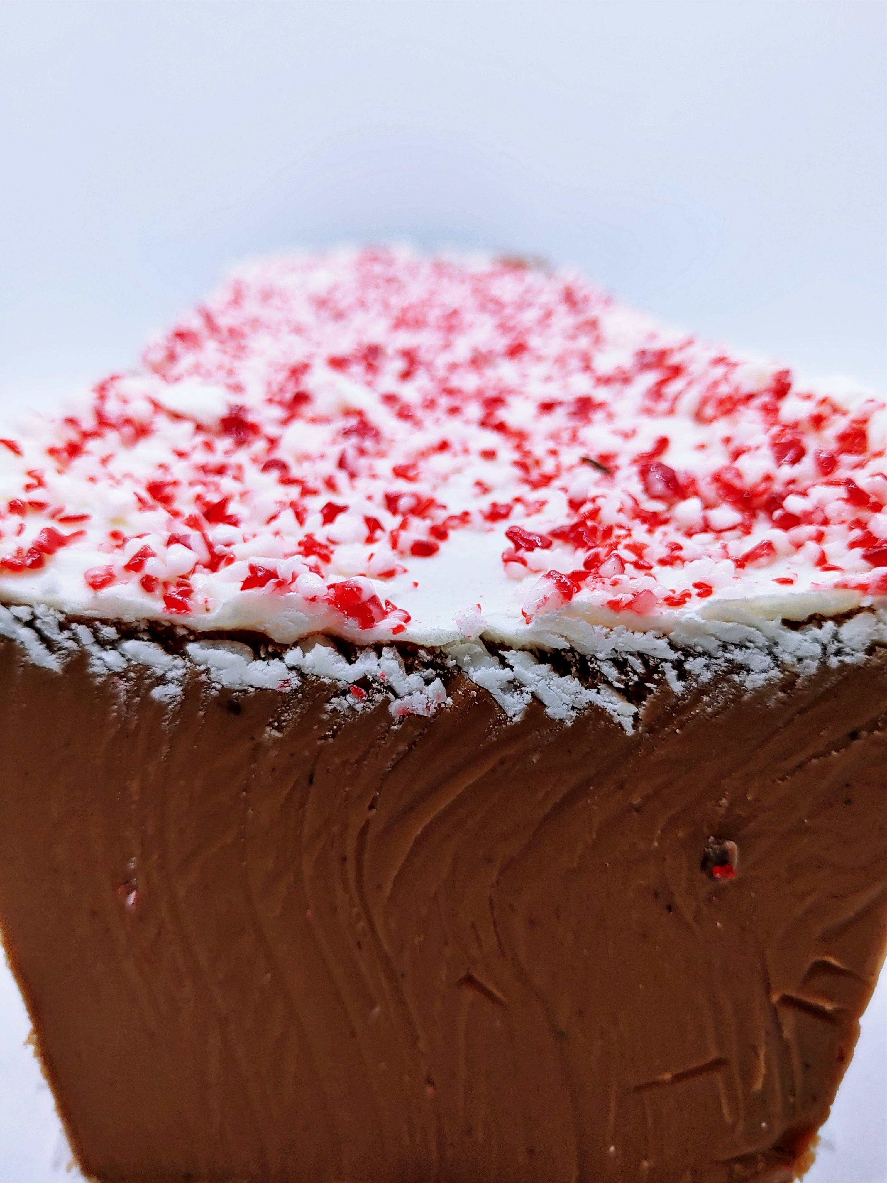 Close-up of a chocolate and peppermint crunch fudge